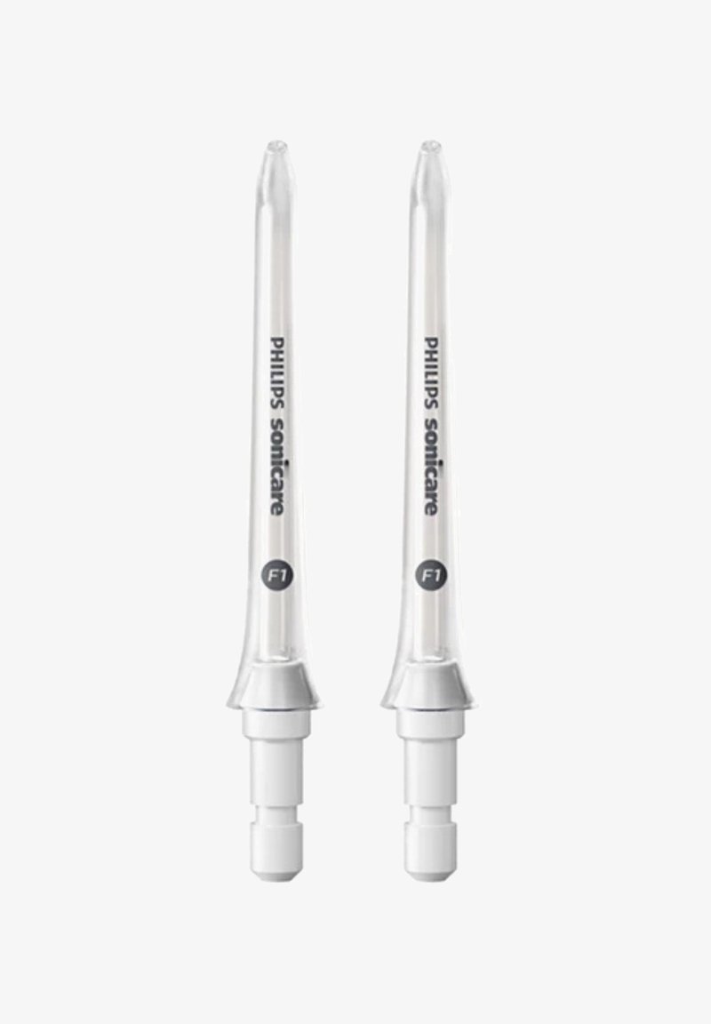 Philips Sonicare F1 Ersatzzahnbürstenköpfe, transparentes Plastik, länglich schlanke Form, mit weißem Verbindungssockel und schwarzer Beschriftung.