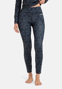 Granatowe legginsy z geometrycznym wzorem, wykonane z elastycznego materiału. Wysoki stan i logo Roxy po boku. Dopasowany krój.