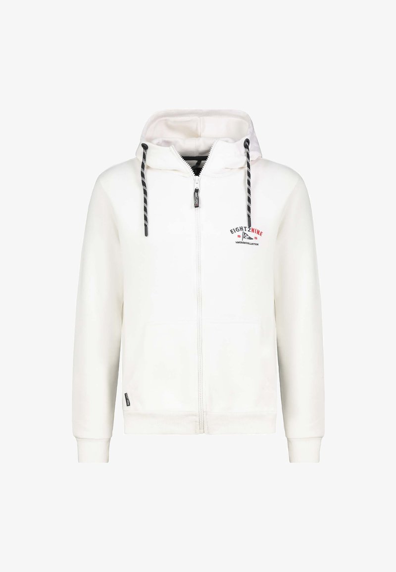 Weiße Zip-Up-Hoodie aus weichem Stoff, mit Kapuze zum Zuziehen, Seitentaschen und einem Logo auf der Brust. Schwarz-weiße gestreifte Akzente.