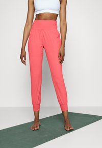 Athleta SALUTATION JOGGER - Calças de fato de treino - coral petal