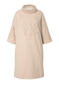 Beige, knielanges Kleid mit hohem Kragen und kurzen Ärmeln. Verfügbar mit dezentem Blumenstickerei in einer etwas dunkleren Nuance. Weiche Stofftextur.