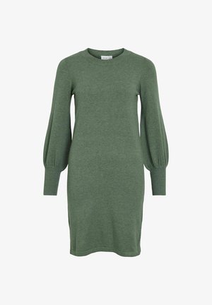 Zaļa adīta kleita ar apaļu kakla izgriezumu un garām, pūkainām piedurknēm. Iekļauj ribotas aproces un ceļa garuma dizainu. Mīksta tekstūra.