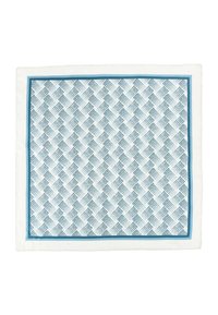 Tovaglietta bianca con un design geometrico blu, bordata da un bordo blu solido. Realizzata in tessuto con una superficie testurizzata.