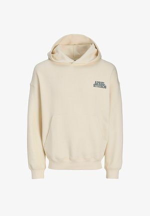 Sudadera color crema con bolsillo frontal, corte holgado y puños de acanalado. Presenta el logo "APRIL STUDIOS" en azul oscuro en el pecho.