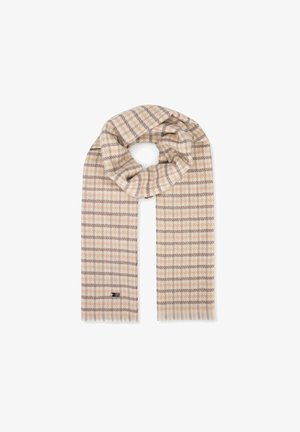 Écharpe à carreaux beige et crème en tissu doux, présentant un motif tissé avec des bords à franges et une petite étiquette de marque à une extrémité.