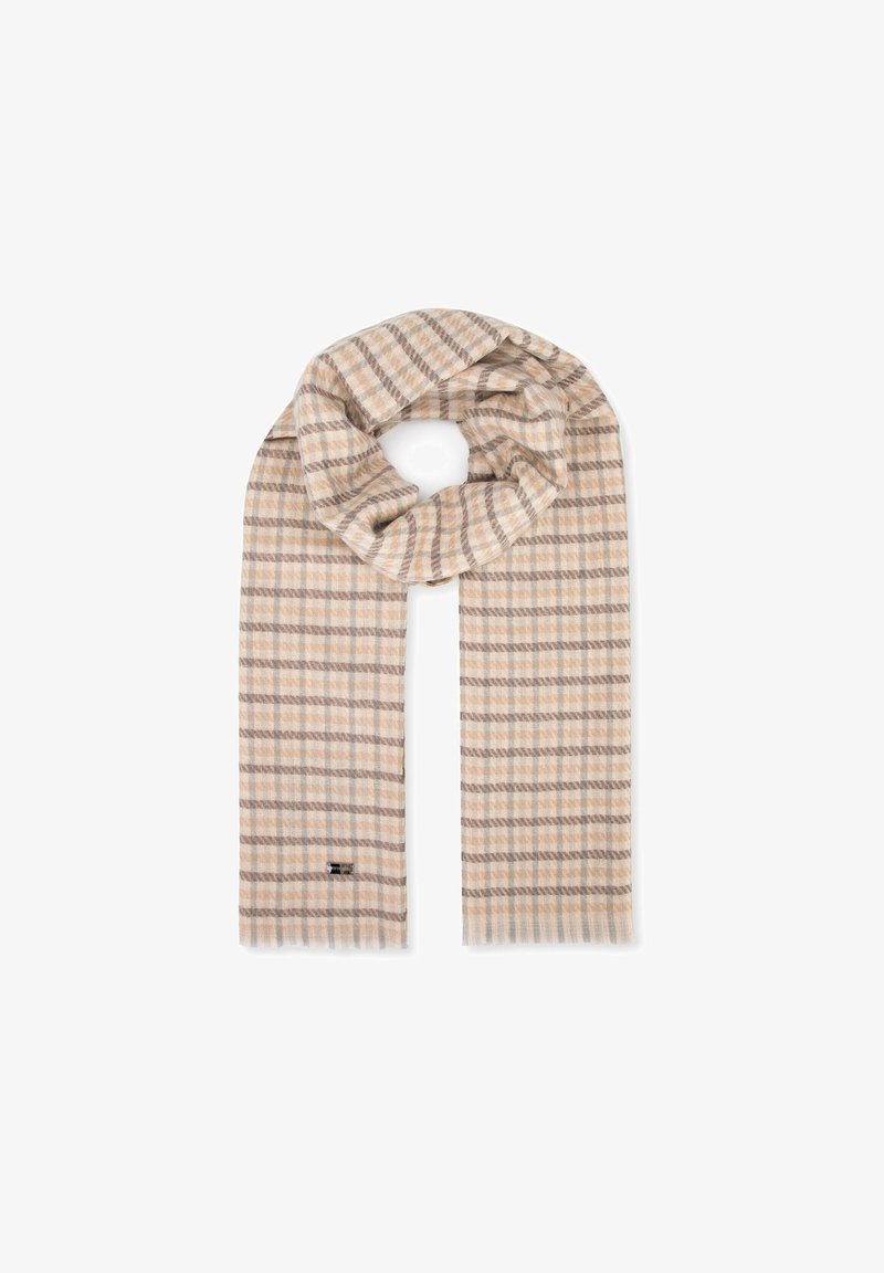 Écharpe à carreaux beige et crème en tissu doux, présentant un motif tissé avec des bords à franges et une petite étiquette de marque à une extrémité.