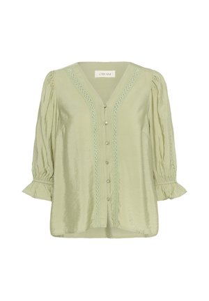 Svetlozelená blúzka s výstrihom do V, naberanými rukávmi a čipkovým lemovaním vpredu. Obsahuje dekoratívne gombíky a jemnú, hladkú textúru.