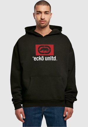 Black hoodie with front pocket, red graphic logo featuring a stylized animal and text "*eckō unltd." in white. Soft texture, relaxed fit.