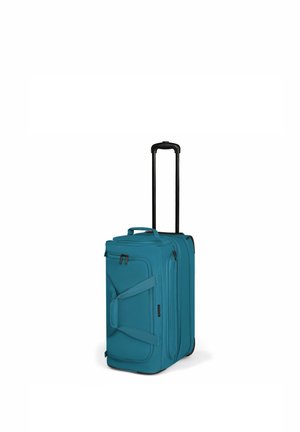 Valigia morbida blu con ruote, manico telescopico, tasche frontali e laterali con zip e maniglie, su sfondo bianco.