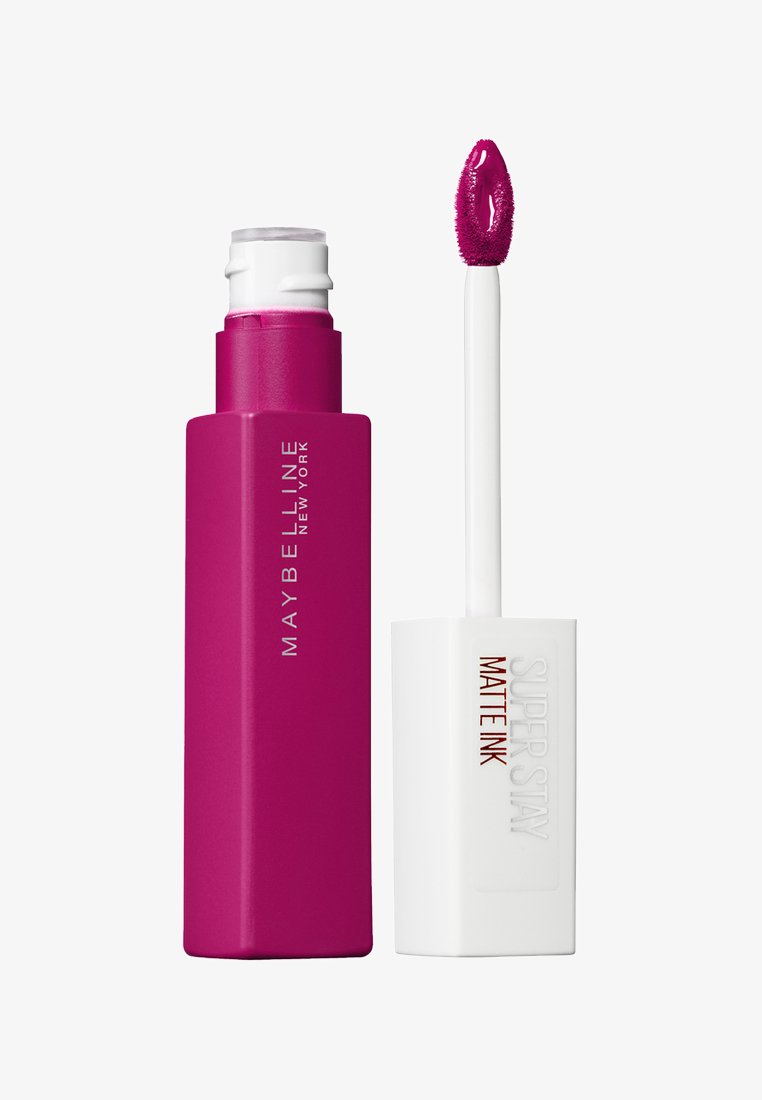 Rouge à lèvres liquide Maybelline Super Stay Matte Ink en fuchsia, contenant rectangulaire rose avec applicateur blanc, équipé d'un embout en forme de pied de d'oie.
