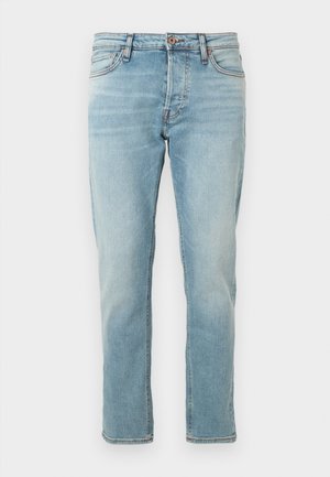 Jeans din denim de un albastru deschis, cu o croială dreaptă, design cu cinci buzunare și decolorare subtilă. Închidere cu nasture la talie, finisaj curat la tivuri.