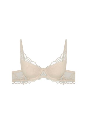 Beige lace bra with padded cups, scalloped edges, and a floral pattern; features adjustable straps and a hook-and-eye closure at the back.
