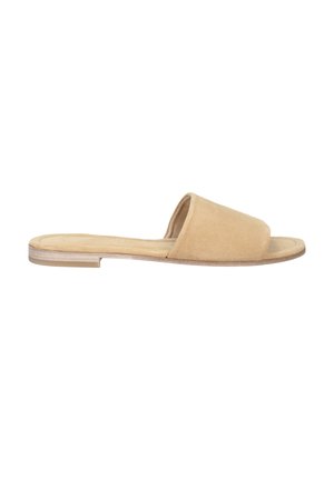 Beige suede slip-on sandals with a wide toe strap, flat sole, and minimalistic design. Accented by a subtle light-colored bottom edge.