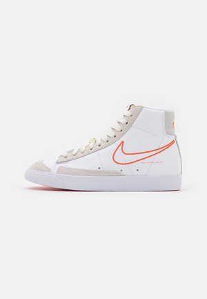 Baskets montantes - white