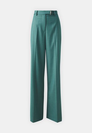 Türkise, hochgeschnittene Hose mit geradem, weitem Bein-Design, versehen mit Falten vorne und einem Metallreißverschluss-Akzent am Bund.