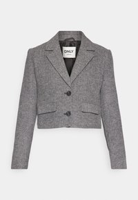 Veste courte gris chevrons à revers crantés, deux boutons noirs, poches à rabat, et doublure en satin noir.