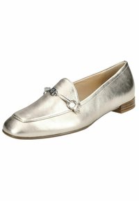 Metallic silver loafers with a sleek, flat shape, featuring a decorative silver accent and a leather-like texture. Light brown heel.