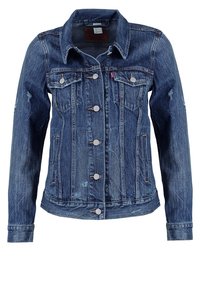 Denim jacket with a dark blue wash, distressed accents, a button front, two chest pockets, and a collared neckline.