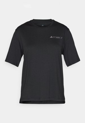 T-shirt noir à manches courtes fabriqué en tissu léger. Il présente un col rond et un petit logo "TERREX" blanc sur la poitrine.