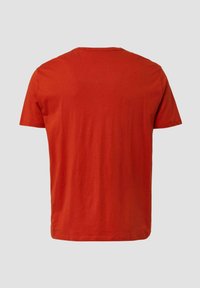 Kurzärmliges T-Shirt in kräftigem Orange, aus weicher Baumwolle gefertigt. Verfügt über einen Rundhalsausschnitt und ein gerades Schnittdesign.