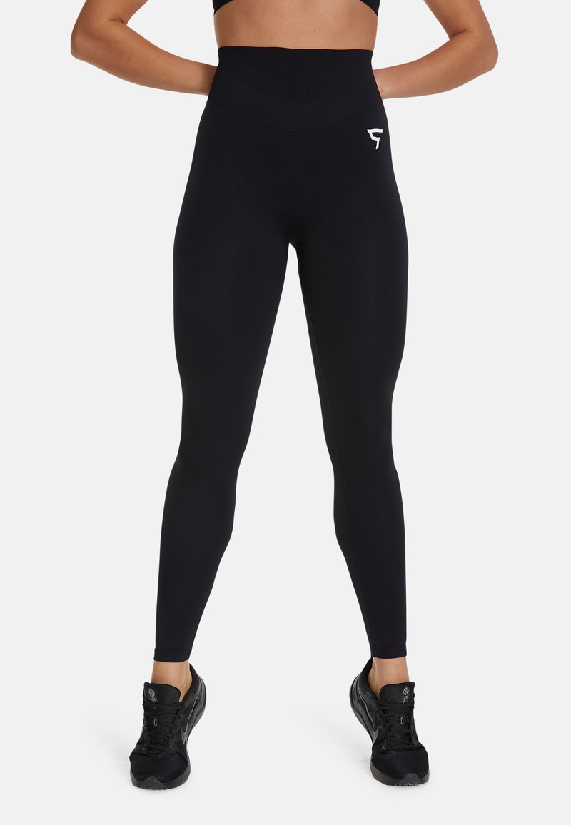 Zwarte high-waisted leggings van rekbare stof, met een logo-accent op de bovenbeen en een gladde, strakke pasvorm.