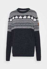 Donkerblauw gebreid sweater met een witte gegroefde schouderpas, voorzien van bladmotieven en geometrische accenten. Ronde hals en geribde manchetten.