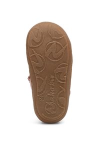 Brun gummisula med en strukturerad yta med cirkulära mönster och varumärkeslogotyper. Kanten är slät och något rundad.