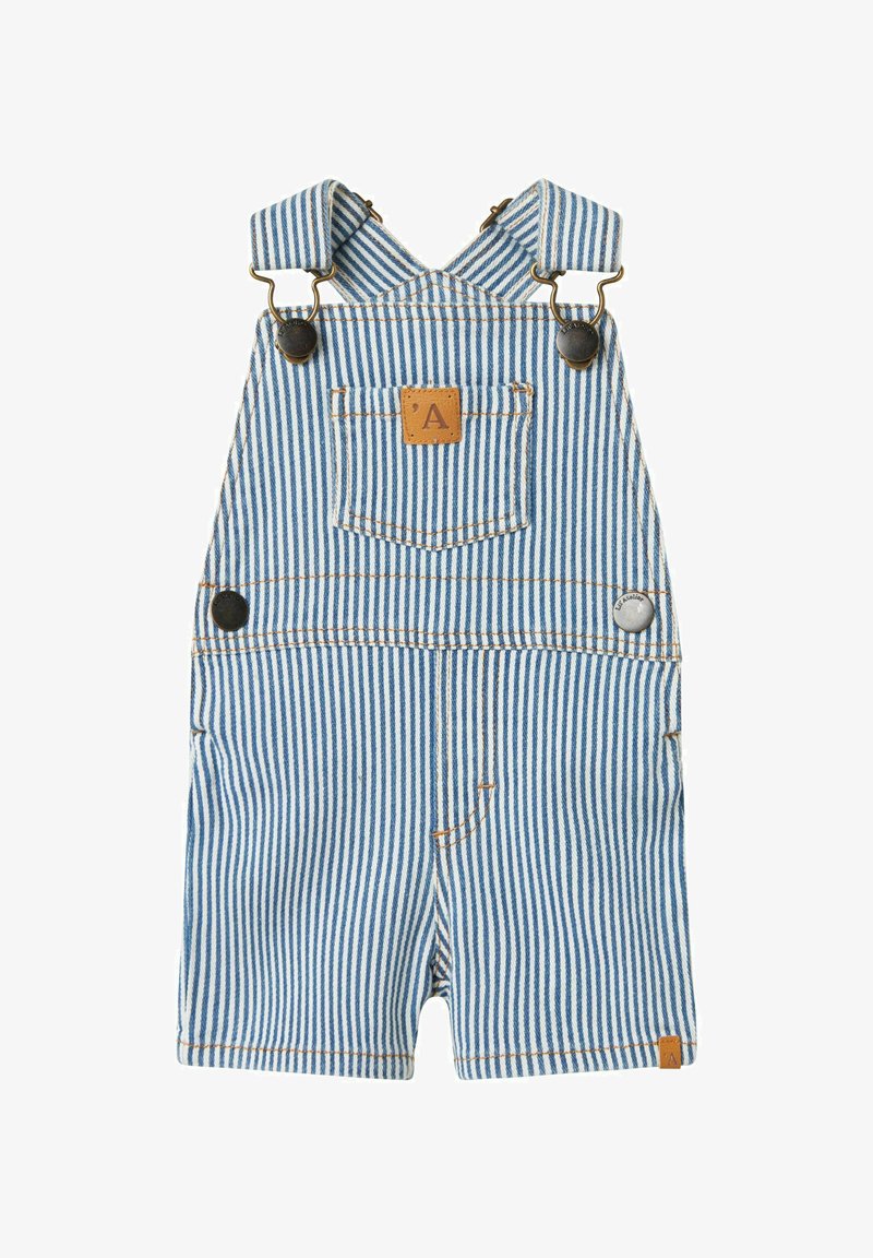 Salopette en denim à rayures bleues et blanches avec des bretelles, quincaillerie en métal, poche sur la poitrine et étiquette en cuir marron.