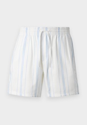 Hvite shorts med blå vertikale striper, laget av textured stoff. Har en elastisk midje med snor.