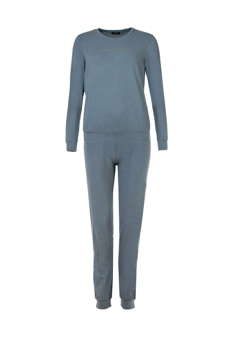 Top bluastro a maniche lunghe e pantaloni coordinati in tessuto morbido. Il top presenta un collo rotondo e polsini a coste; i pantaloni hanno una vita elasticizzata.