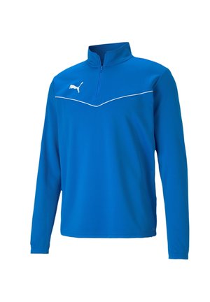 Pull-over de sport bleu en tissu léger. Il possède un col zippé mi-haut et un piping blanc sur la poitrine. Logo sur l'épaule gauche.