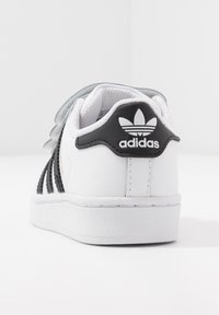 adidas superstar slip on Marron enfant