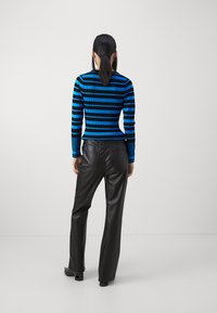 DKNY BOREUM PANTS - Nadrágok - black