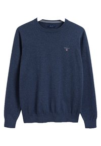 Marineblauer Pullover aus Strickstoff, mit Rundhalsausschnitt, langen Ärmeln, gerippten Bündchen und einem kleinen Logo auf der Brust.
