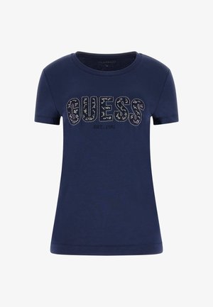 Marineblauw T-shirt met korte mouwen met "GUESS" in strass-steentjes en "EST. 1981" gedrukt eronder aan de voorkant.