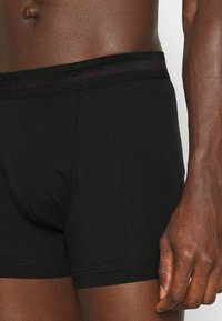 Calvin Klein Underwear TRUNK 3 PACK COTTON STRETCH - Cuecas boxer - black
