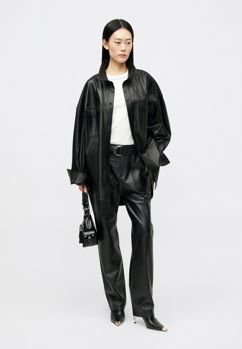 Pantalon En Cuir The Kooples - Peau D'agneau Slim Noir Taille 28, Look Rock Et élégant Pour Homme