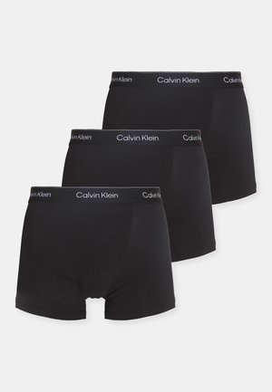 Schwarze Baumwoll-Boxershorts im Dreierpack. Mit einem weichen, elastischen Bund mit dem Calvin Klein-Logo in Weiß. Glatte Textur.