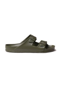 Infradito verde con due fibbie regolabili, realizzato in morbido materiale gommoso. Presenta una soletta sagomata e una suola texturizzata per una migliore aderenza.