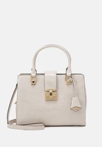 Cream-colored handbag with a croc-embossed texture, gold hardware, top handles, and a detachable shoulder strap. Features a flap closure.