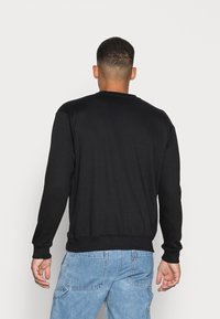 Mennace Sudadera - black