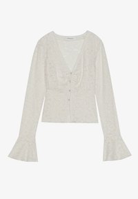 Top bianco in pizzo con scollatura a V profonda, chiusura a bottoni e maniche lunghe a sbuffo con motivi di rose su un tessuto testurizzato.