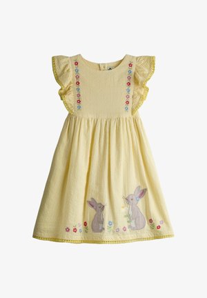 Vestito a righe gialle con maniche a volant, ricami floreali e due illustrazioni di coniglietti sull'orlo; tessuto di cotone strutturato.