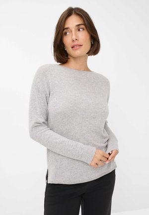 Light gray sweater with a classic round neckline, long sleeves, soft texture, side slits, and subtle stitching details at the hem.