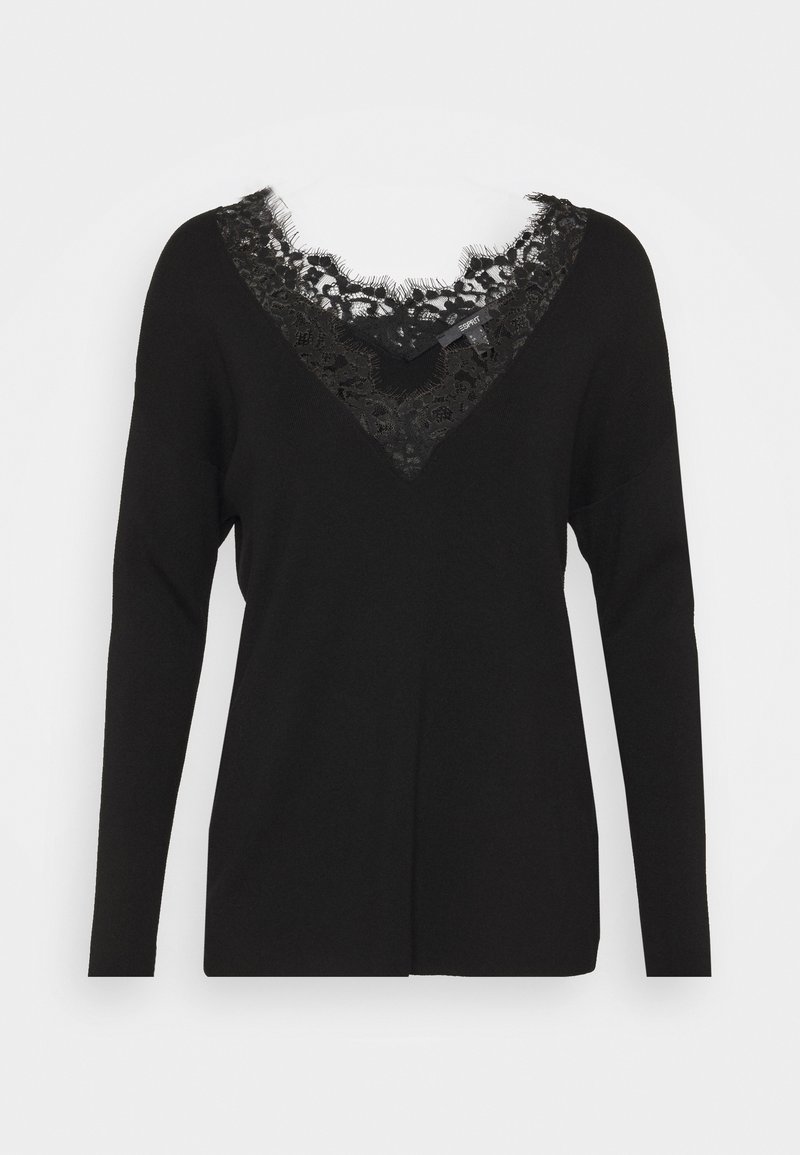 Pull noir à manches longues avec encolure en V, présentant une insertion superposée de dentelle noire au niveau de l'encolure.