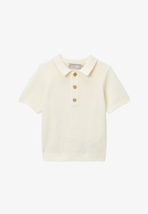 Polo en maille couleur crème à manches courtes avec col et ourlet côtelés, comportant trois boutons en bois sur le devant.