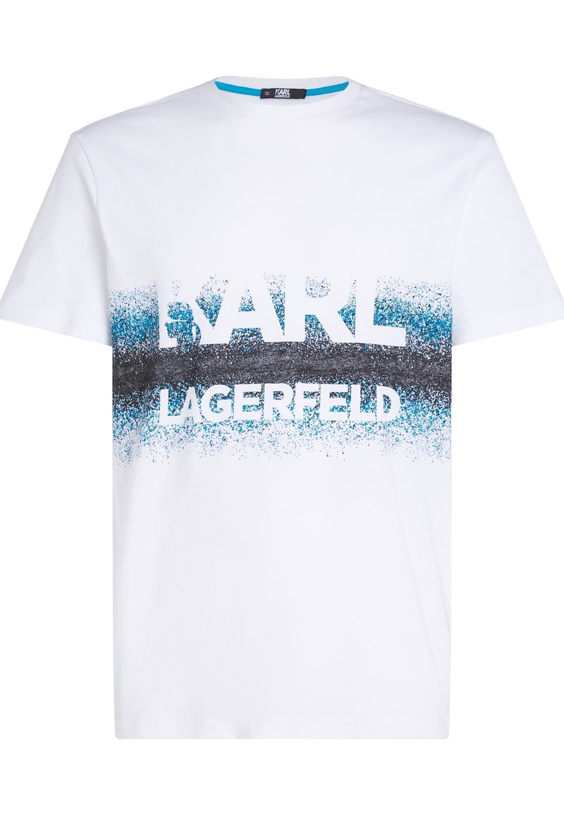 Bílý bavlněný tričko se stínováním a modrými a černými skvrnami, s tučným textem "KARL LAGERFELD". Krátké rukávy.