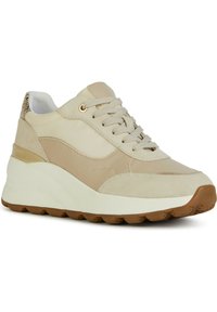 Sneaker beige con una combinazione di materiali lisci e testurizzati. Design con lacci, collo imbottito e suola bianca spessa con dettagli in gomma color caramello.