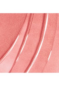 Gloss rose lisse et brillant avec des paillettes, présenté en traits incurvés et superposés sur fond blanc.