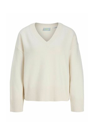 Suéter de punto color crema con mangas largas, cuello en V acanalado, puños acanalados y dobladillo acanalado.